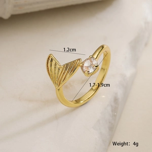 Detail view of 18K gold mermaid tail ring with zircon and 1.2cm adjustable open design