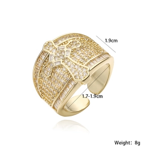 Detail view of 18K gold plated cross ring with micro-paved zircons and 1.9cm width