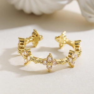 18K gold-plated adjustable open ring with four sparkling clover-shaped zircon accents