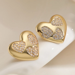 Vintage style gold plated heart stud earrings with white zircon accents for women