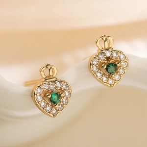 Exquisite gold-plated heart stud earrings with crown detail and green zircon stone