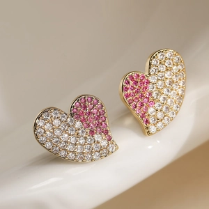 Elegant heart earrings featuring 18K gold plating and pink zirconia stones in a micro-pave setting