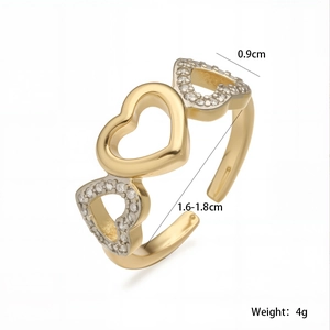 Detailed view of gold plated heart ring showing dimensions 0.9cm and adjustable opening