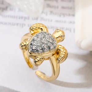 Elegant gold turtle ring with sparkling pavé crystals and an adjustable open band
