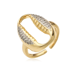 Detail of gold plated open ring featuring symmetrical zircon encrusted arc design elements