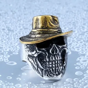 Vintage punk cowboy skull ring in silver and gold two-tone stainless steel finish