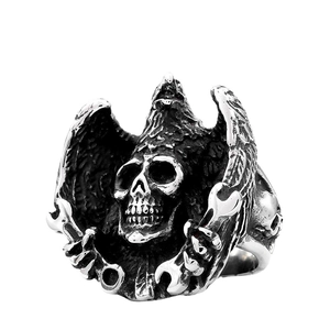 Gothic skull ring for men with eagle wings and wrench detail in retro stainless steel