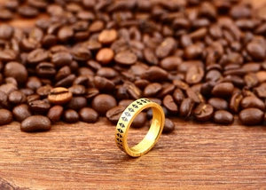Detail of S925 sterling silver gold ring with black triangle pattern and internal engraving