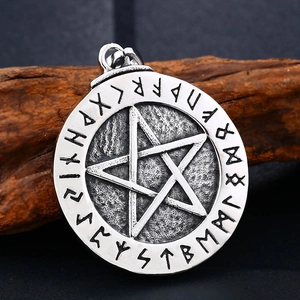 Vintage stainless steel Viking pendant featuring pentagram and Nordic runes on wood