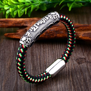 Ethnic braided leather bracelet with silver mantra cylinder and polished steel magnetic clasp