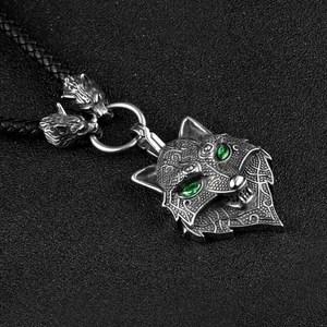 Nordic viking wolf head pendant necklace with green gemstone eyes and braided leather cord