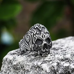 Men's vintage gothic skull ring with intricate vine carvings in stainless steel