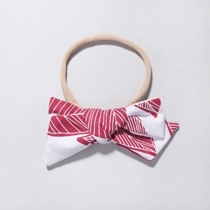 Fascia per capelli neonata in nylon con grande fiocco stampato rosso e bianco