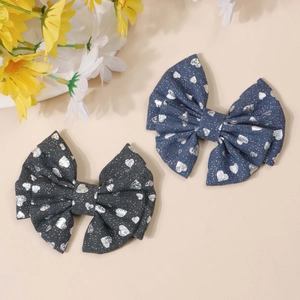 Denim bow hair clips with silver heart sequins in navy blue and black colors
