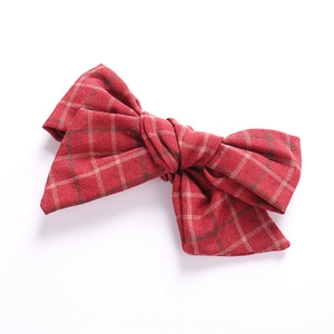 Red plaid linen cotton bow hair clip for girls with classic checkered pattern design