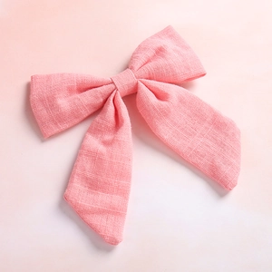 Pink slub cotton swallowtail bow hair clip for girls with soft woven texture finish