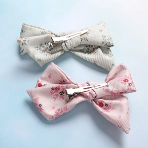 Barrettes à nœuds fleuris pour enfants avec clips crocodiles métalliques lot de deux