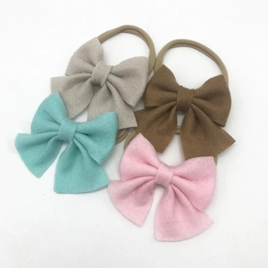 Set of 4 soft felt oversized bow headbands for babies with elastic nylon hair bands