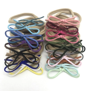Lot de 16 bandeaux bébé en nylon élastique avec petits nœuds en velours colorés