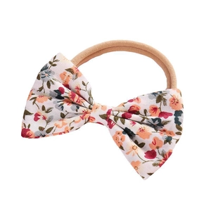 Bandeau bébé avec nœud floral et sangle en nylon élastique pour petites filles
