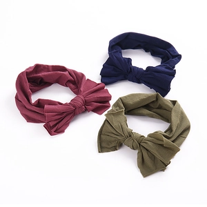 Lot de trois bandeaux en nylon pour bébé avec grands nœuds en bordeaux, marine et vert