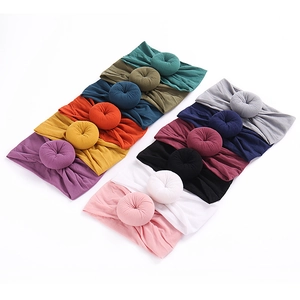 Set of 12 colorful nylon baby headbands with soft doughnut knot design and elastic wide bands
