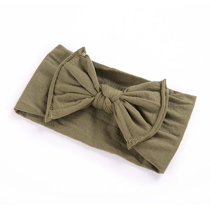 Olive green elastic bow headband for infants made of soft ribbed knit fabric