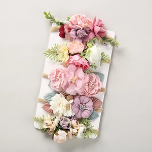 Set of five handmade floral baby headbands with mesh flowers and elastic bands
