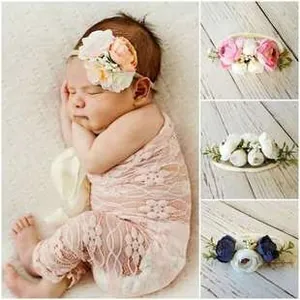 Detail of floral baby headbands featuring handmade fabric flowers and elastic bands