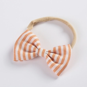Bandeau bébé à rayures avec nœud orange et blanc sur bande en nylon doux