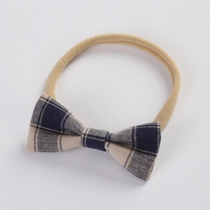 Détail du bandeau à nœud écossais avec bande en nylon souple pour nouveau-nés