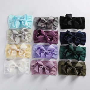 12-piece baby nylon headbands with 5-inch grosgrain ribbon bows in assorted colors