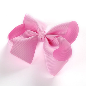 Detailansicht der 12,7 cm rosa Ripsband-Haarschleife mit sichtbarer Rippenstruktur