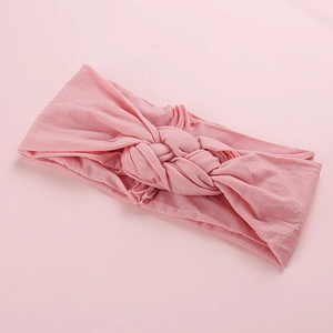 Détails du bandeau en nylon pour bébé en tricot doux avec un nœud central torsadé