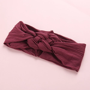 Bandeau hiver en nylon souple pour bébés avec nœud torsadé en rouge bordeaux foncé chaud