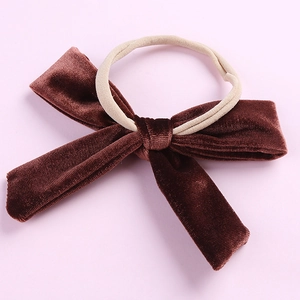 Bandeau bébé avec grand nœud en velours rouge foncé et sangle en nylon élastique