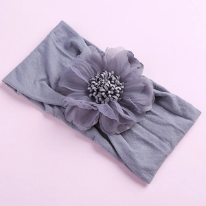 Soft grey nylon baby headband featuring a large layered chiffon flower decoration