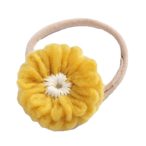 Bandeau à fleur tricotée jaune fait main avec élastique doux en nylon pour bébés filles