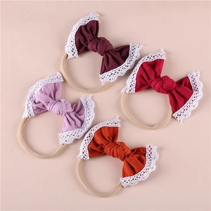 Set of 4 soft nylon baby headbands with colorful lace bows for infant girls