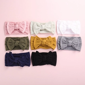 Lot de 8 bandeaux bébé en maille torsadée avec grand nœud et bordure à pompons