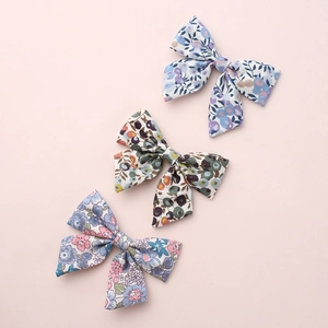 Three-piece set of floral print cotton bow hair clips for girls in pastoral style