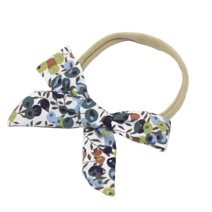 Floral print baby headband with white cotton bow and stretchy nylon band for newborns