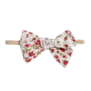 Floral print baby bow headband with soft nylon elastic strap for infants and toddlers