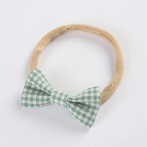 Soft green and white plaid bow headband for babies with high elasticity nylon strap