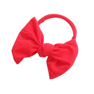 Red bow baby headband made of soft stretchy nylon for infants and photography