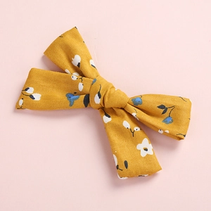 Floral print cotton bow hair clip in yellow with sweet pattern for girls