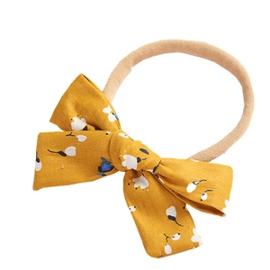 Fascia neonata con fiocco floreale in cotone ed elastico in nylon morbido senza cuciture