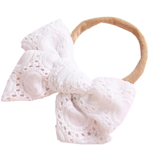 Bandeau bébé avec nœud en dentelle brodée blanche et ruban en nylon élastique souple