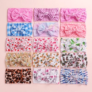 15-pack soft baby headbands with large bows featuring floral and leopard prints