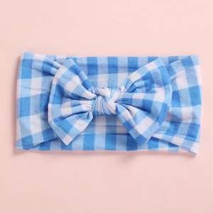 Detailed view of soft blue gingham plaid baby headband with oversized bow knot